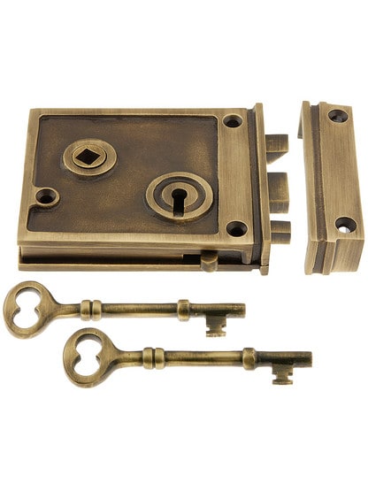Solid Brass Horizontal Rim Lock in Antique Brass.